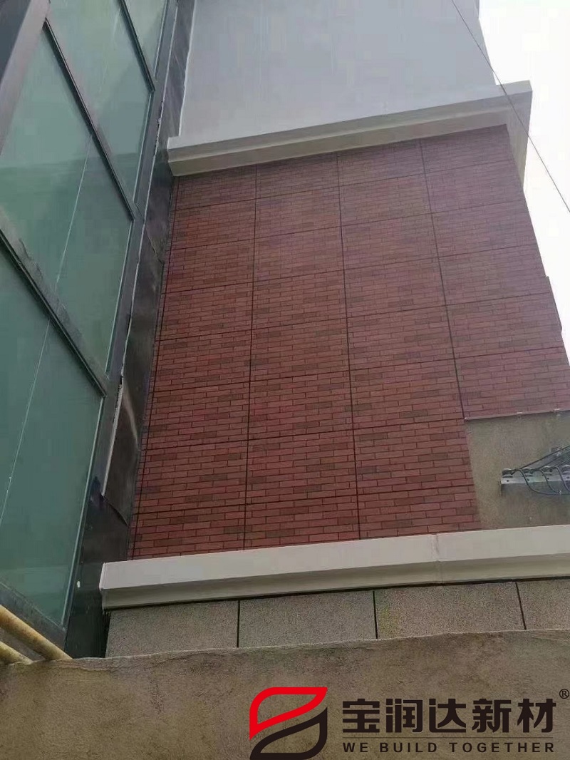 郑州工业技师学院实训楼岩棉真石漆一体板